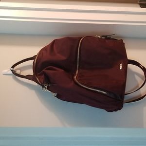 Tumi convertible handbag/backpack crossbody bag
